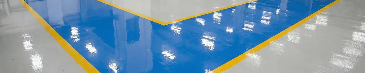 A factory floor professionally covered and marked with epoxy flooring in El Paso, TX