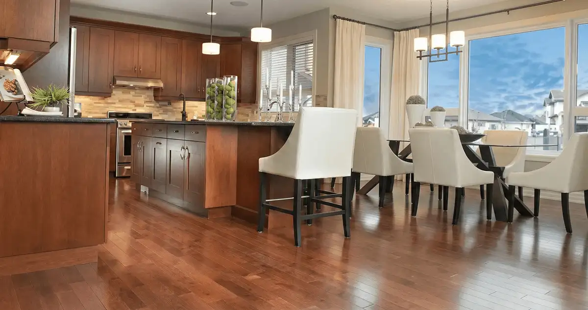 A modern kitchen with professionally installed wood flooring in El Paso, TX