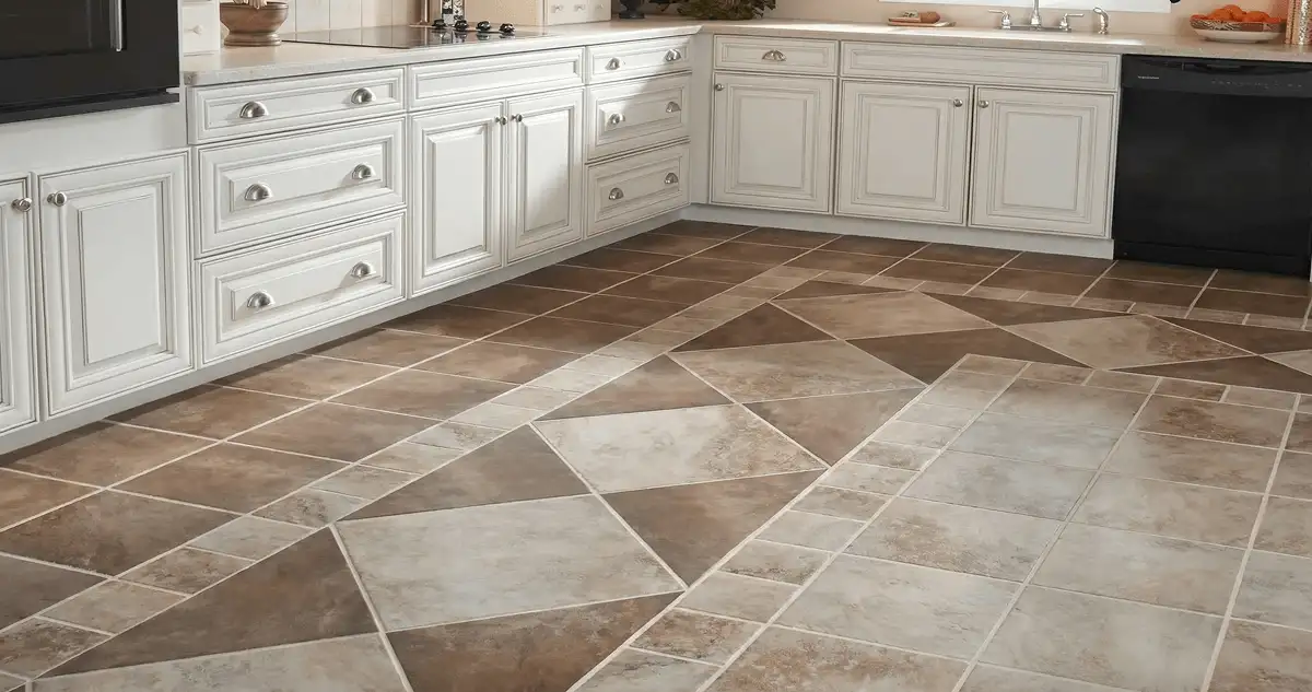 Kitchen with white cabinets and a professionally installed tile floor in El Paso, TX